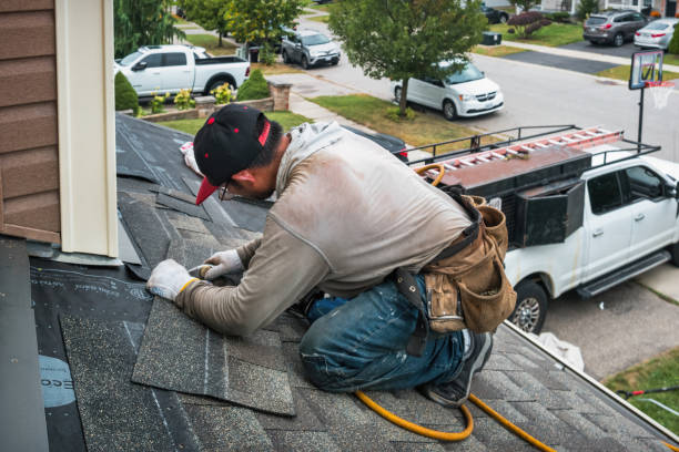 Professional Flat Roof Repair technician working in Kerby, OR
